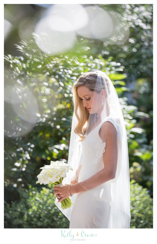A bride ponders her wedding, a Romance in Cape Cod. | Captured by Kelly Cronin Photography