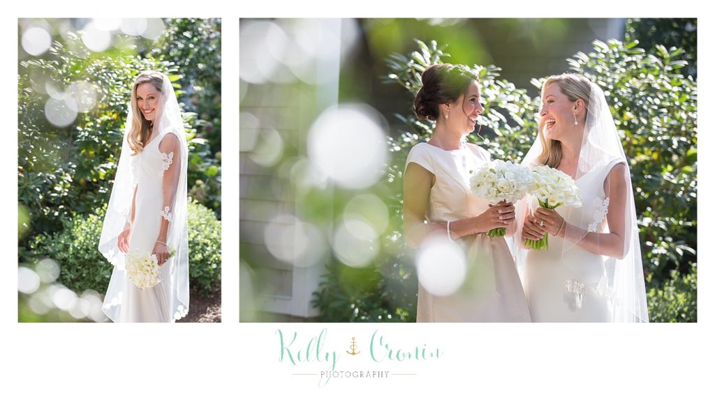 A bride chats with her bride's maid about her Romance in Cape Cod. | Captured by Kelly Cronin Photography
