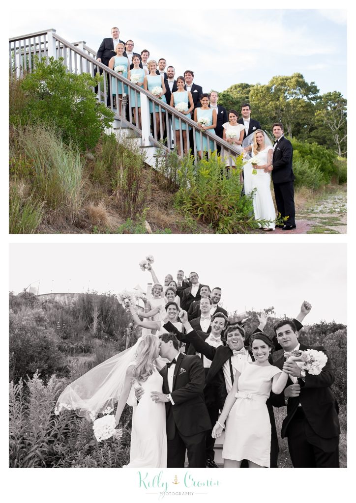 A wedding party poses for photos documenting this couple's Romance in Cape Cod. | Captured by Kelly Cronin Photography