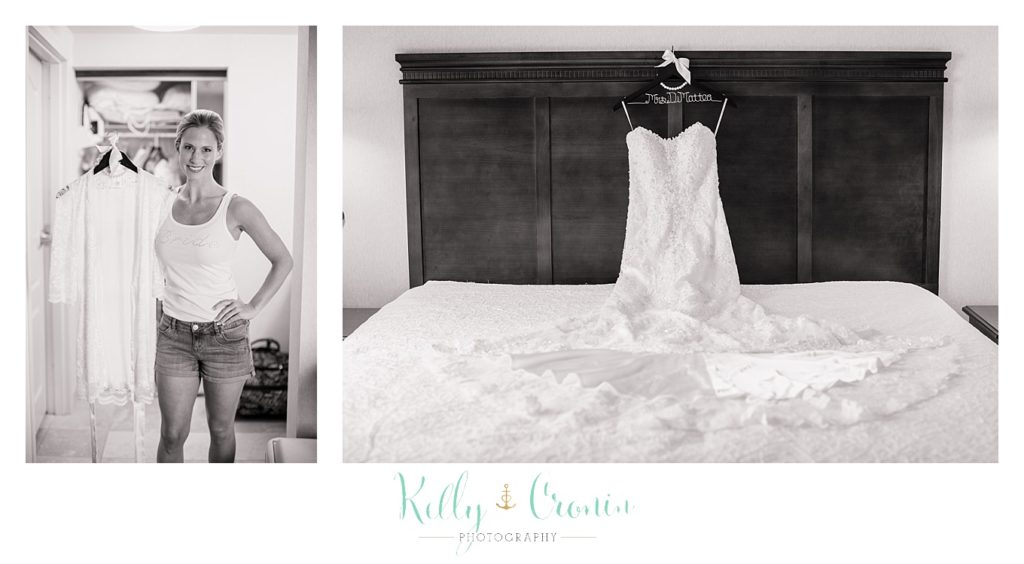 A wedding dress hangs wedding held at the White Cliffs Country club and captured by Kelly Cronin Photography