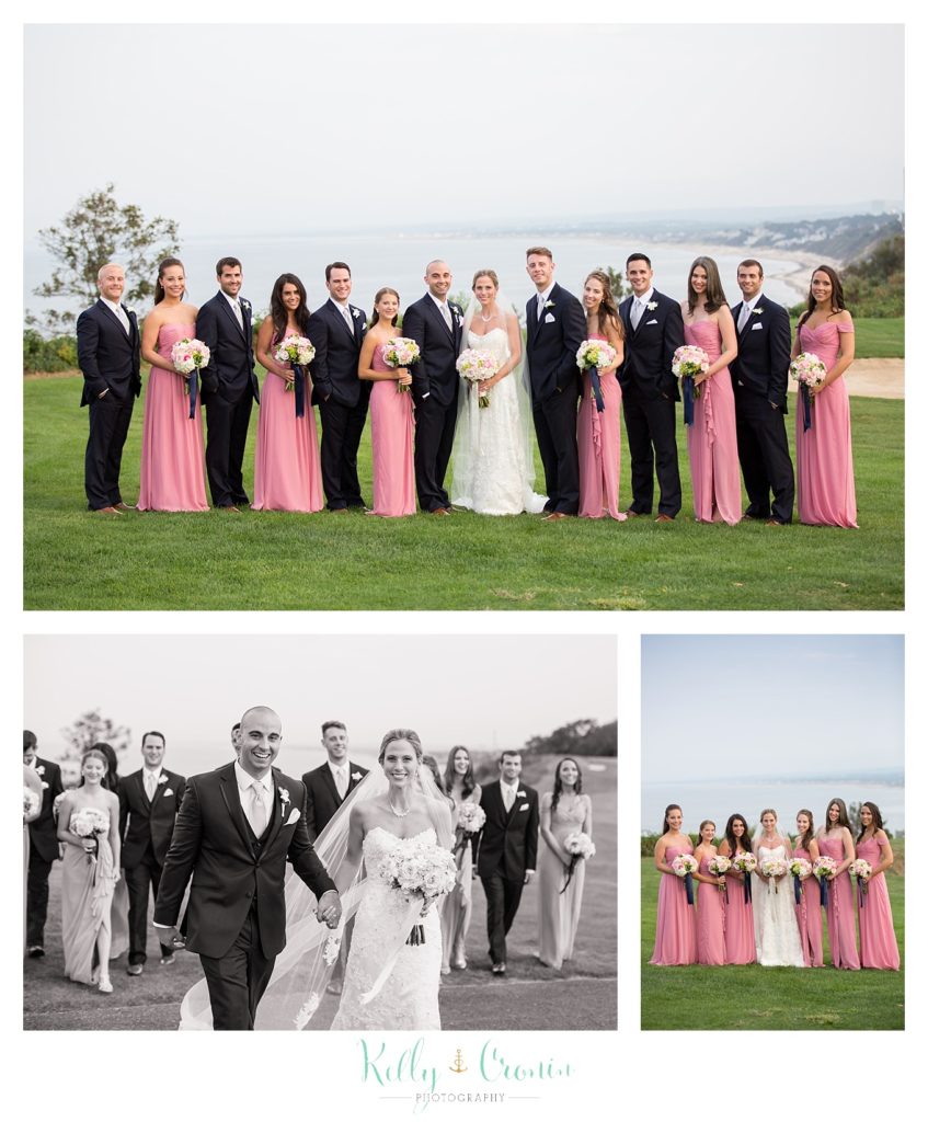 A wedding party stand together, wedding held at the White Cliffs Country club and captured by Kelly Cronin Photography