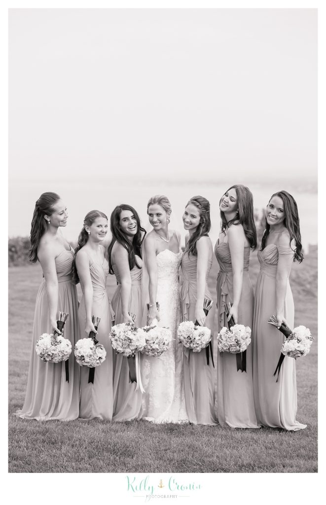 A bridal party smile together, wedding held at the White Cliffs Country club and captured by Kelly Cronin Photography