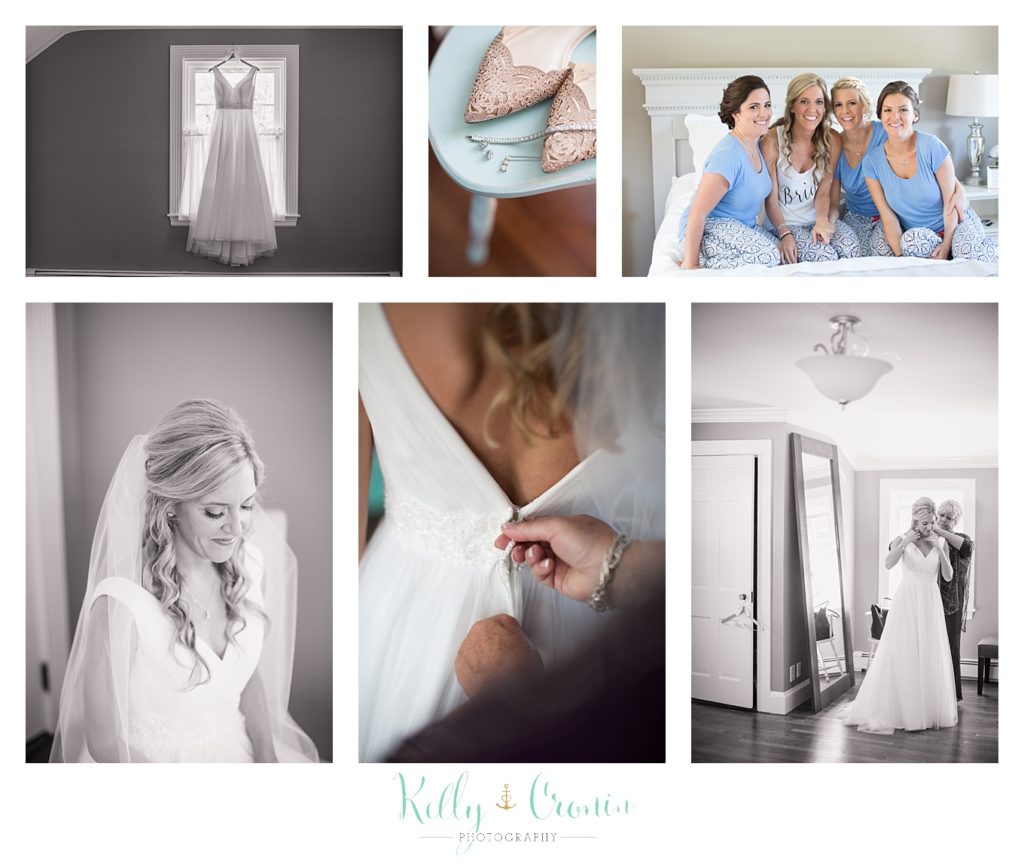 A bride's friends help her get ready for her wedding at The Dennis Inn, captured by Kelly Cronin Photography