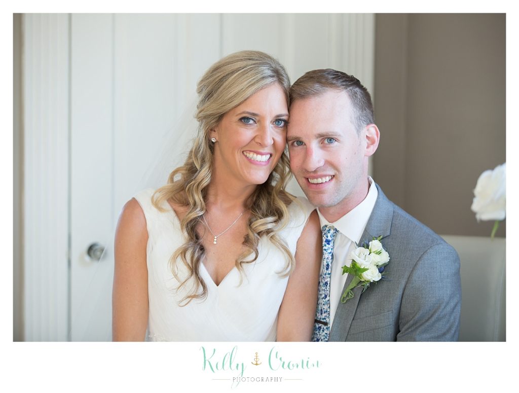 A couple smile after their wedding at The Dennis Inn, captured by Kelly Cronin Photography