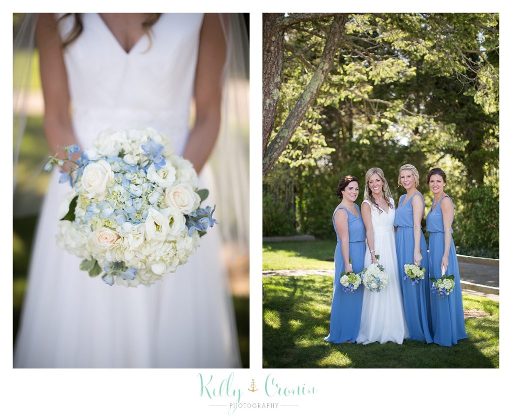 A bouquet is held for a wedding at The Dennis Inn, captured by Kelly Cronin Photography