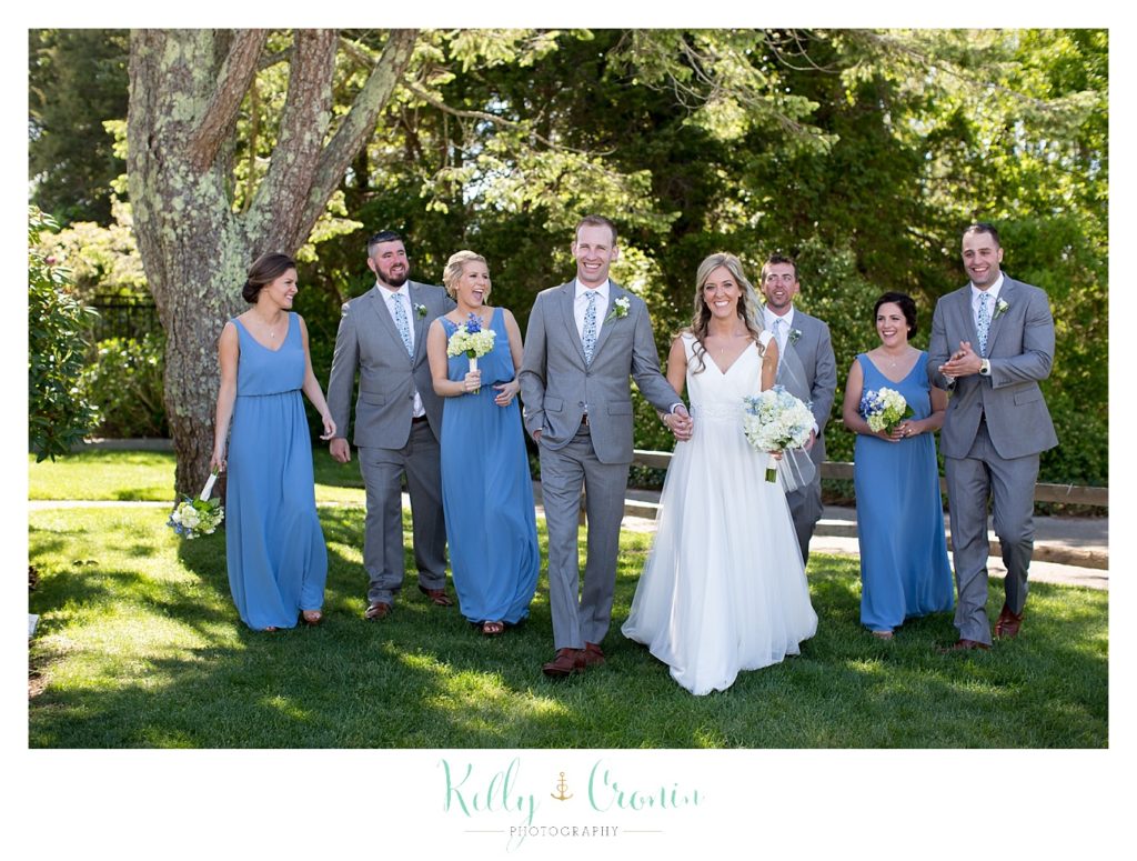 A wedding party celebrates at a wedding at The Dennis Inn, captured by Kelly Cronin Photography