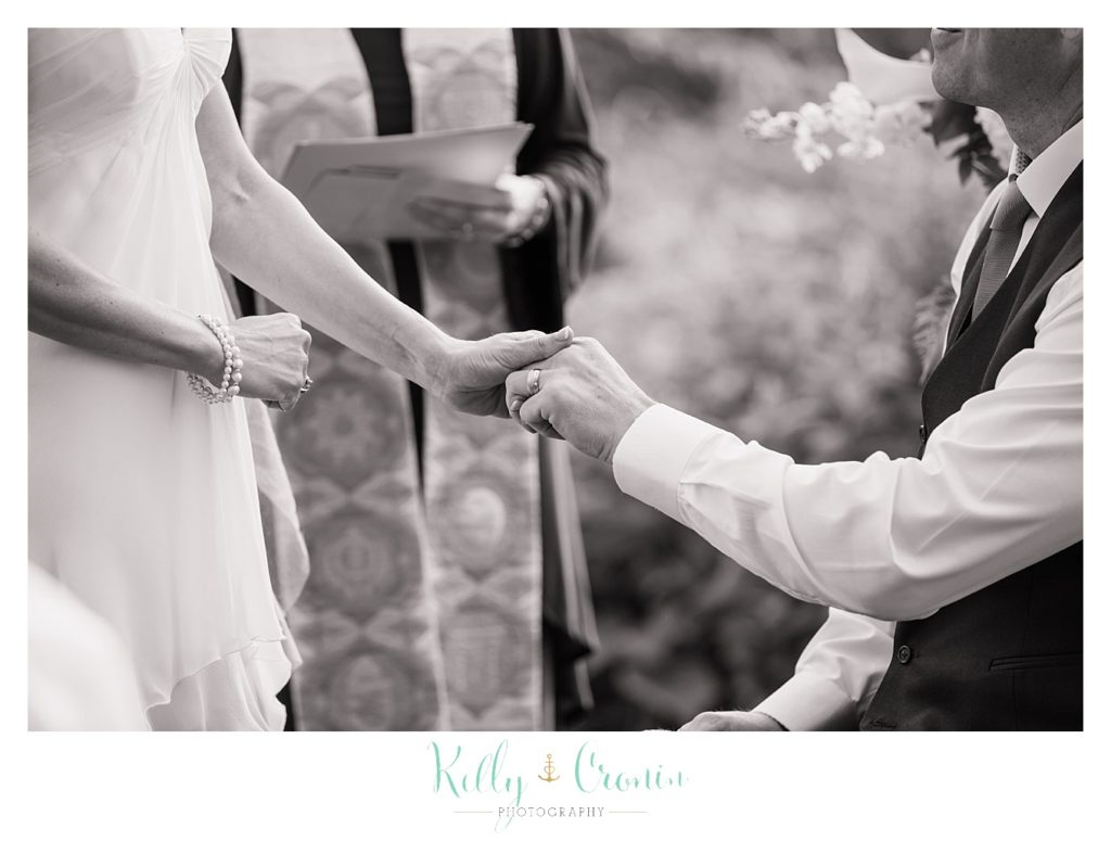 A bride and groom exchange vows | Kelly Cronin Photography | Chatham Wedding Photographer