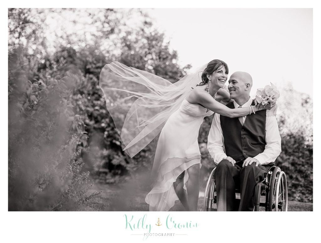A bride's veil flies on the breeze | Kelly Cronin Photography | Chatham Wedding Photographer