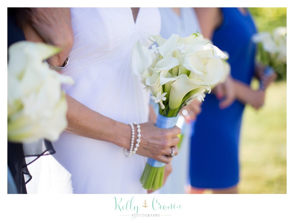 A bride holds her bouquet | Kelly Cronin Photography | Chatham Wedding Photographer