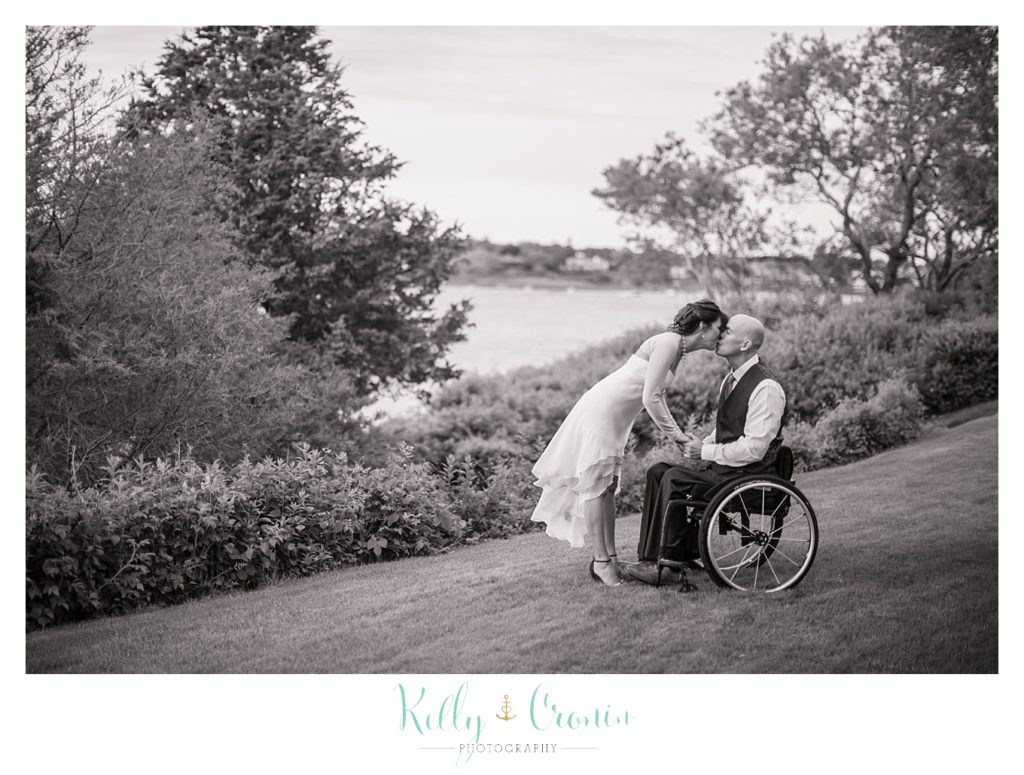 A woman kisses her groom | Kelly Cronin Photography | Chatham Wedding Photographer