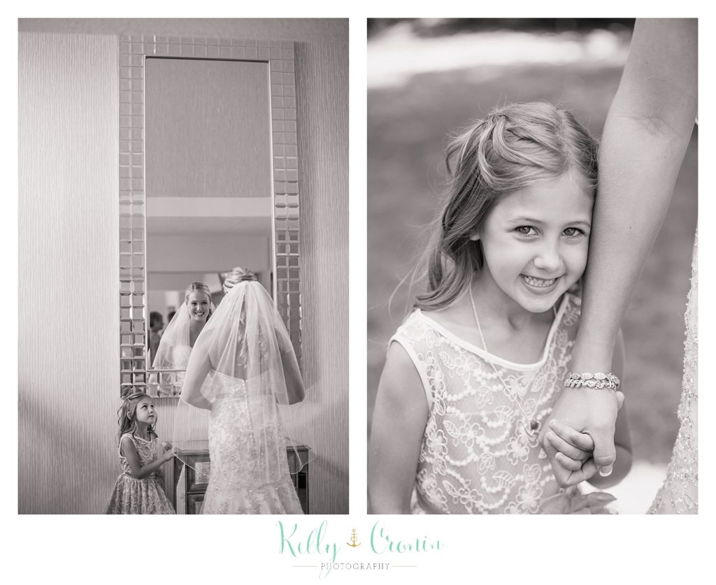 A flower girl holds hands | Kelly Cronin Photography | CJ's Ranch