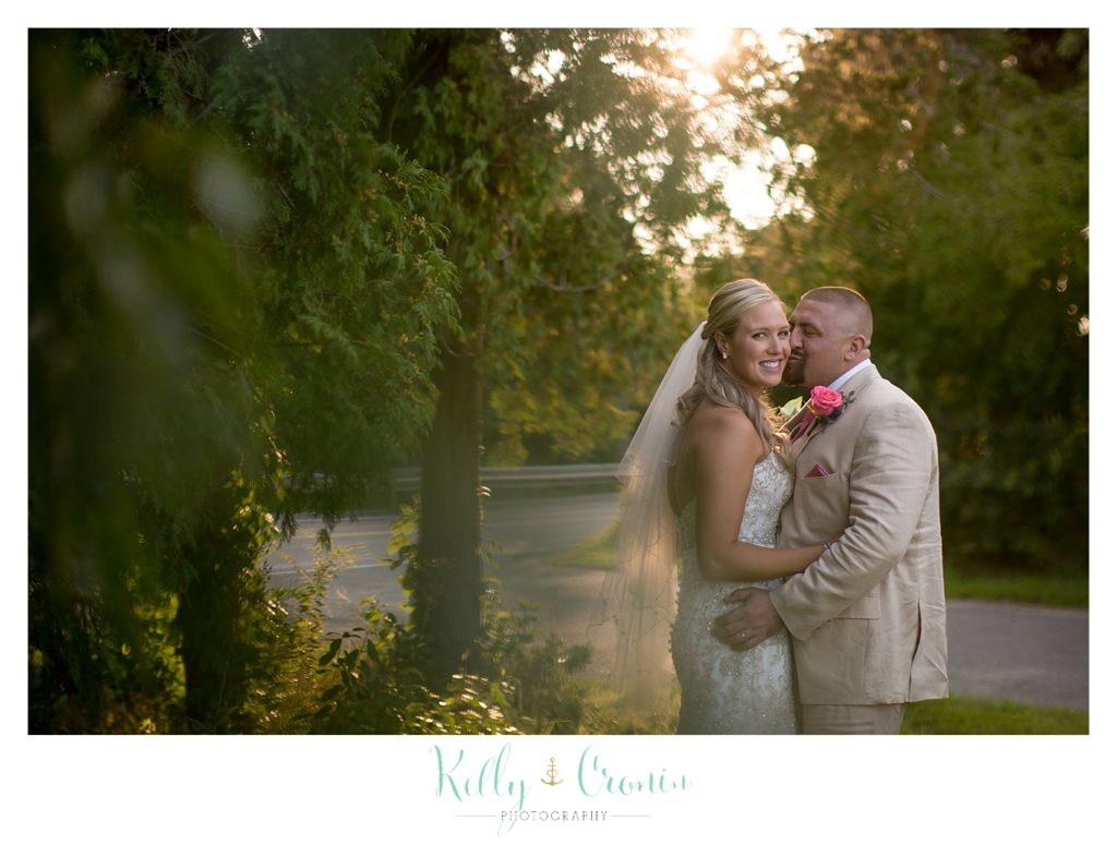 A man whispers to his bride | Kelly Cronin Photography | CJ's Ranch