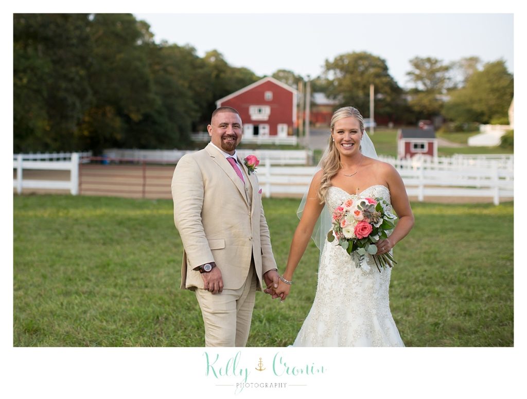 A man takes his wife's hand | Kelly Cronin Photography | CJ's Ranch