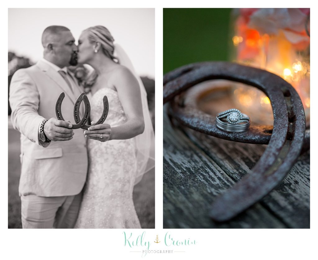 A couple hold a horseshoe while kissing | Kelly Cronin Photography | CJ's Ranch