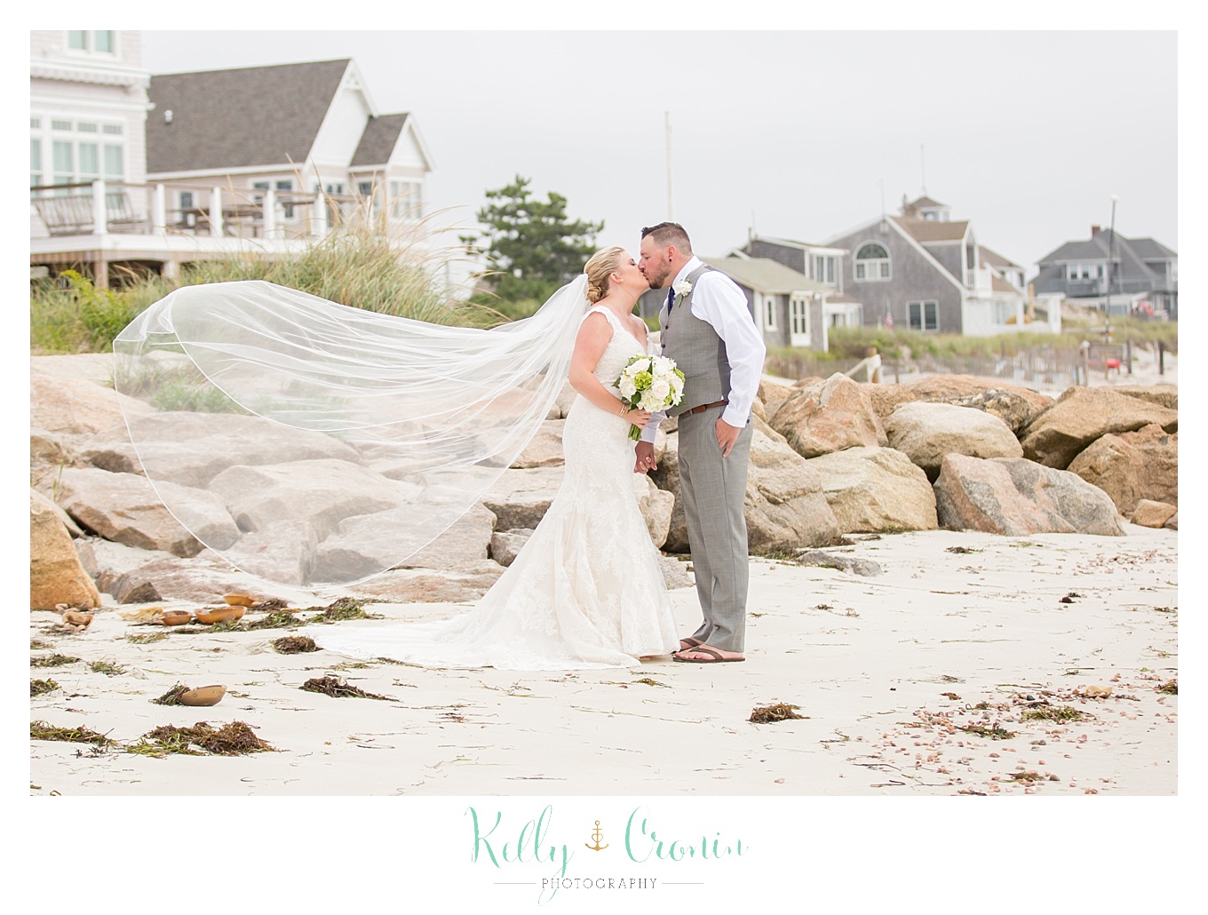 A bride's veil floats on the breeze | Kelly Cronin Photography | Lighthouse Inn