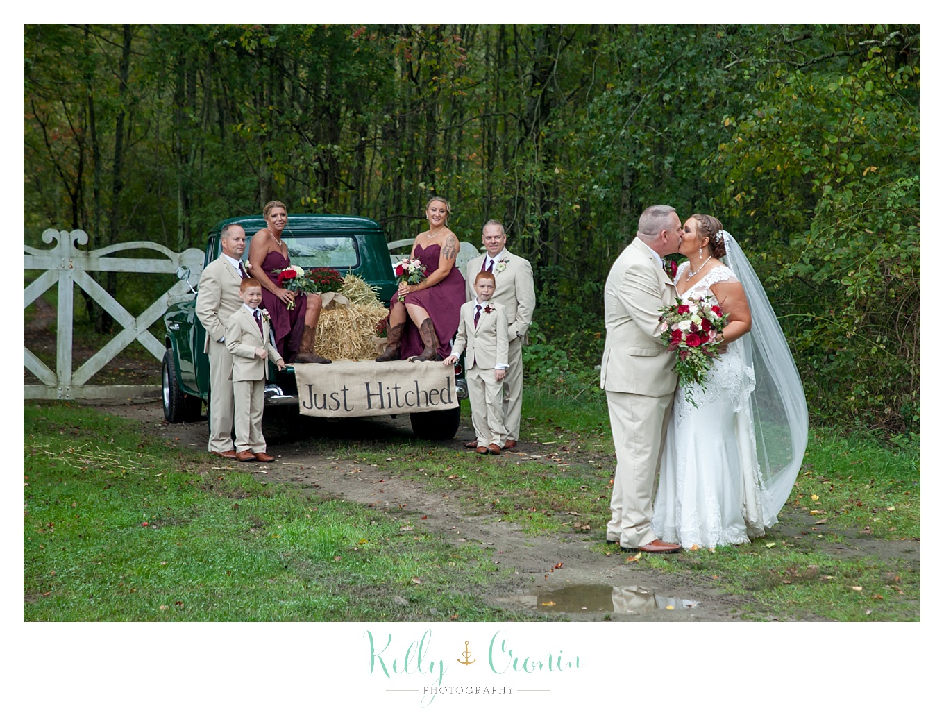 A bride and groom give a kiss | Kelly Cronin Photography | Bittersweet Farm