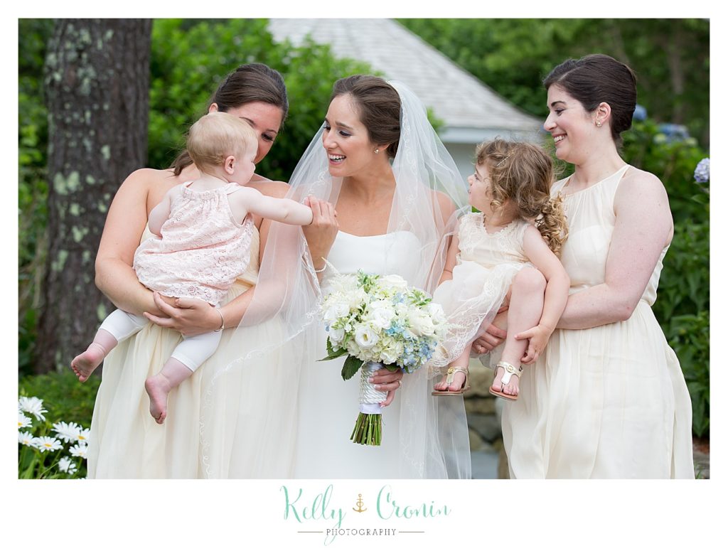 A bride socializes before her wedding | Kelly Cronin Photography | Lighthouse Beach