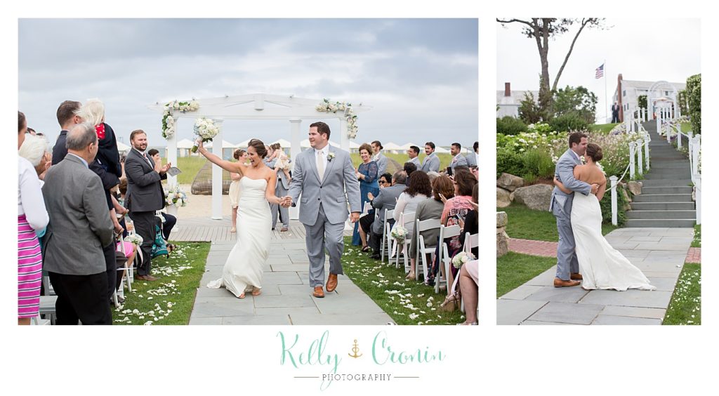 A bride and groom walk down the aisle | Kelly Cronin Photography | Lighthouse Beach