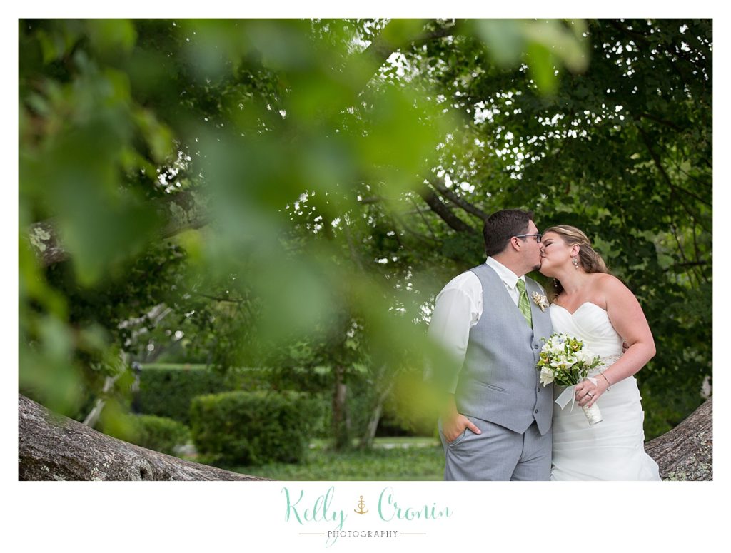 A couple kiss | Kelly Cronin Photography | Ocean Edge Resort and Golf Club