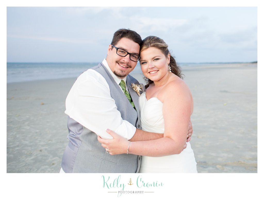 A ban poses with his bride | Kelly Cronin Photography | Ocean Edge Resort and Golf Club