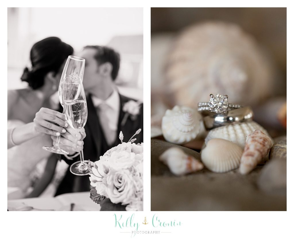 A bride and groom share a toast | Kelly Cronin | Wing's Neck Light 