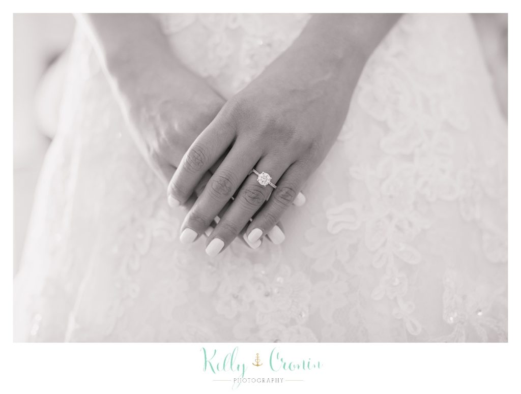 A bride clasps her hands | Kelly Cronin | Wing's Neck Light 