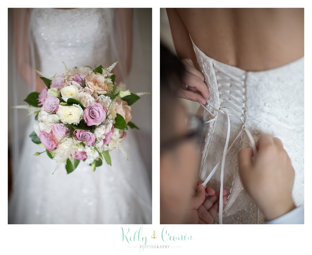 A wedding dress is laced up | Kelly Cronin | Wing's Neck Light 