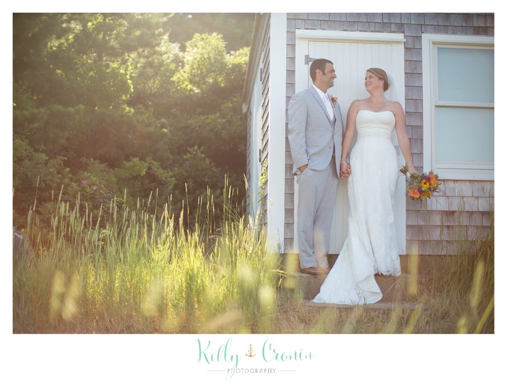 A newlywed couple stare into each other's eyes  | Kelly Cronin Photography | Oyster River Landing