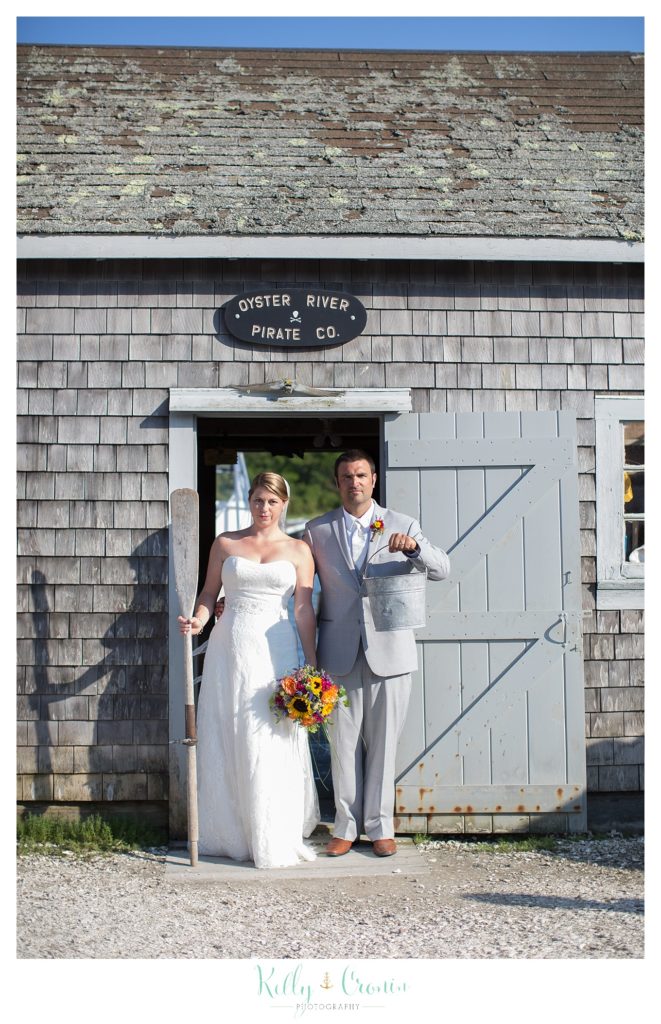 A married couple celebrate their wedding  | Kelly Cronin Photography | Oyster River Landing