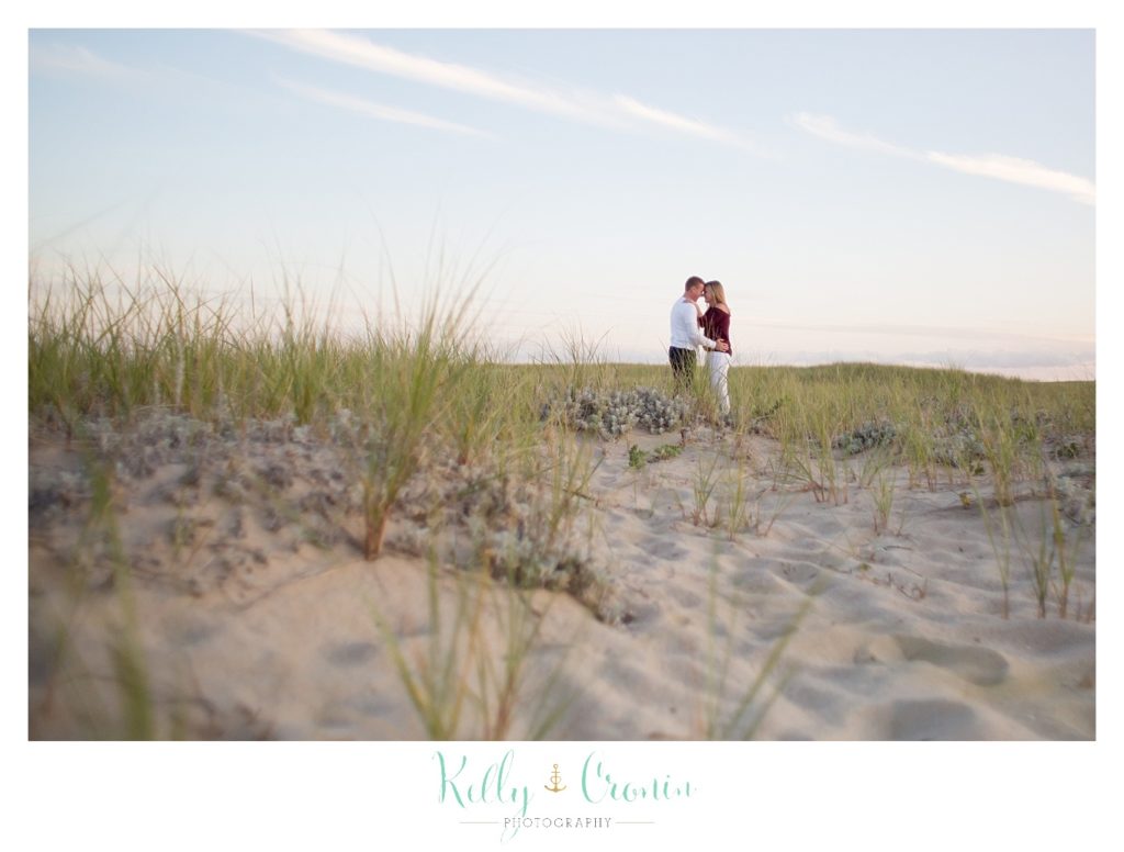 An engaged couple kiss | Kelly Cronin Photography | Cape Cod Engagement Photographer