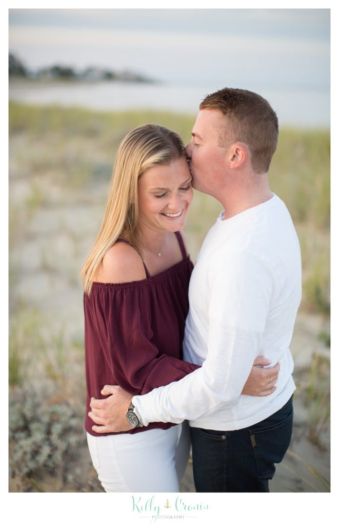 A man kisses his love | Kelly Cronin Photography | Cape Cod Engagement Photographer