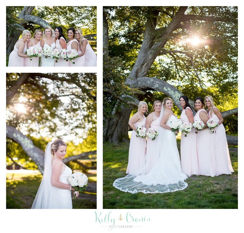 A bride poses with her bridal party | Kelly Cronin Photography | Resort Wedding in Cape Cod