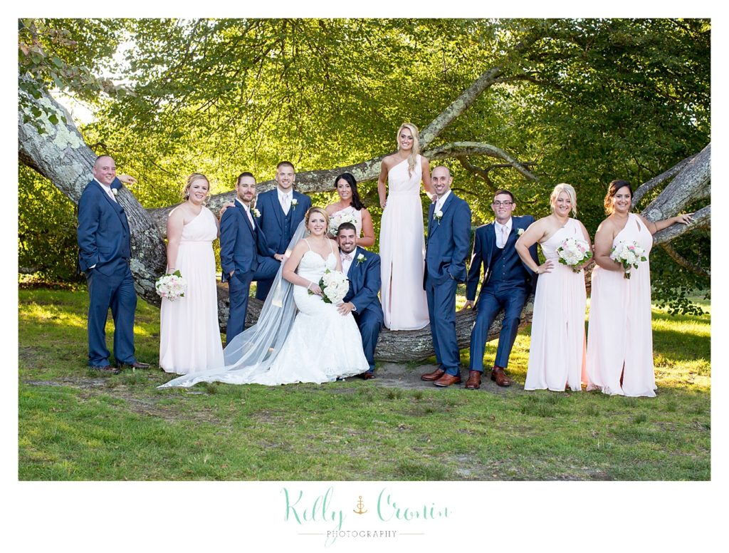 A wedding party have a bit of fun | Kelly Cronin Photography | Resort Wedding in Cape Cod