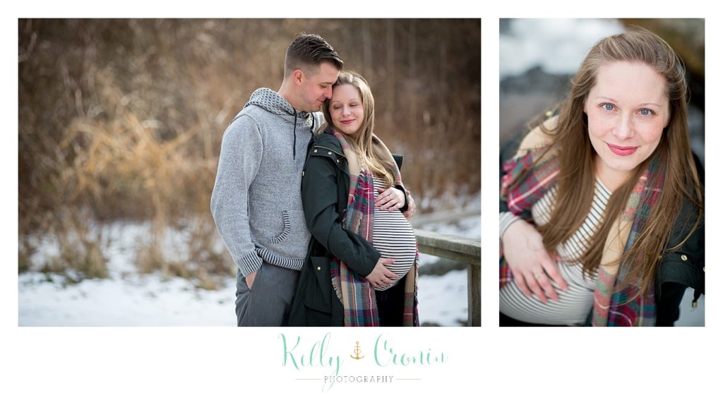 A woman rests her hands on her belly  | Kelly Cronin Photography | Cape Cod Maternity Photographer
