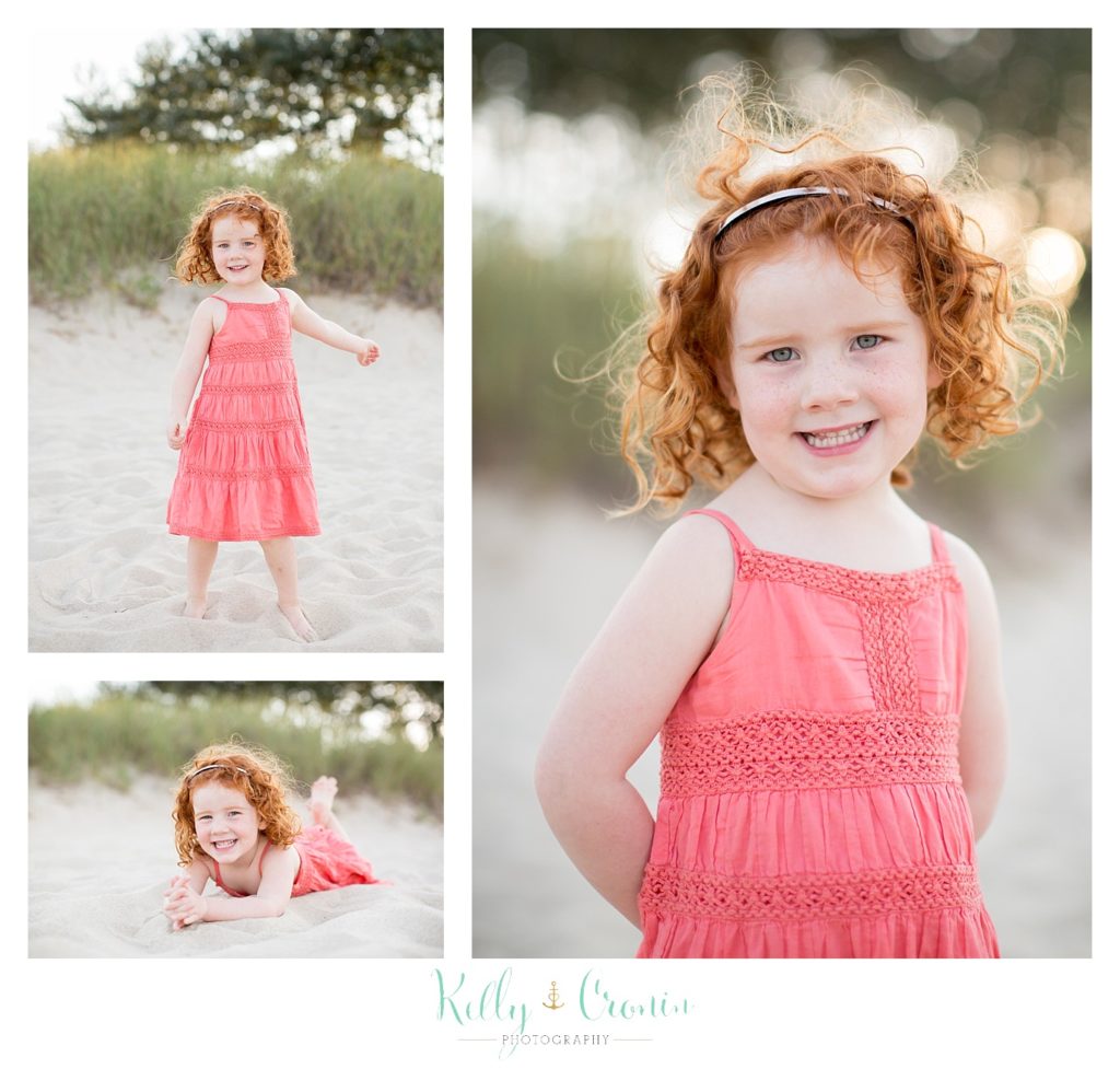 A girl with red curls stands in the sand  | Kelly Cronin Photography | Seaside Photography