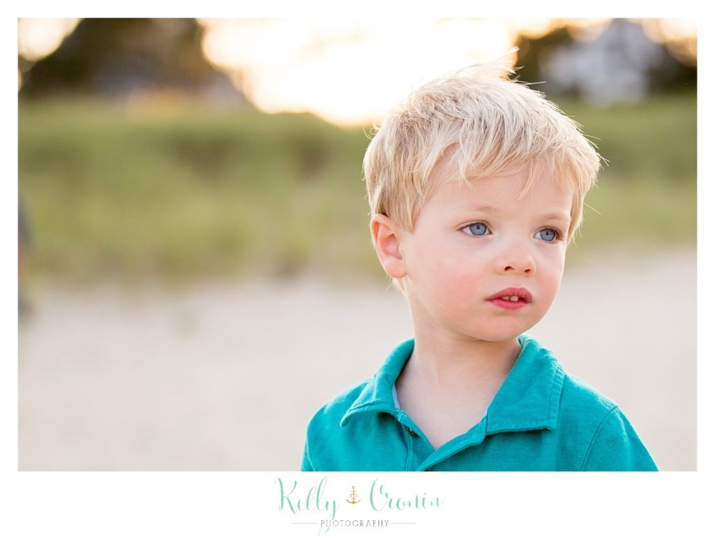 A boy looks off into the distance  | Kelly Cronin Photography | Seaside Photography