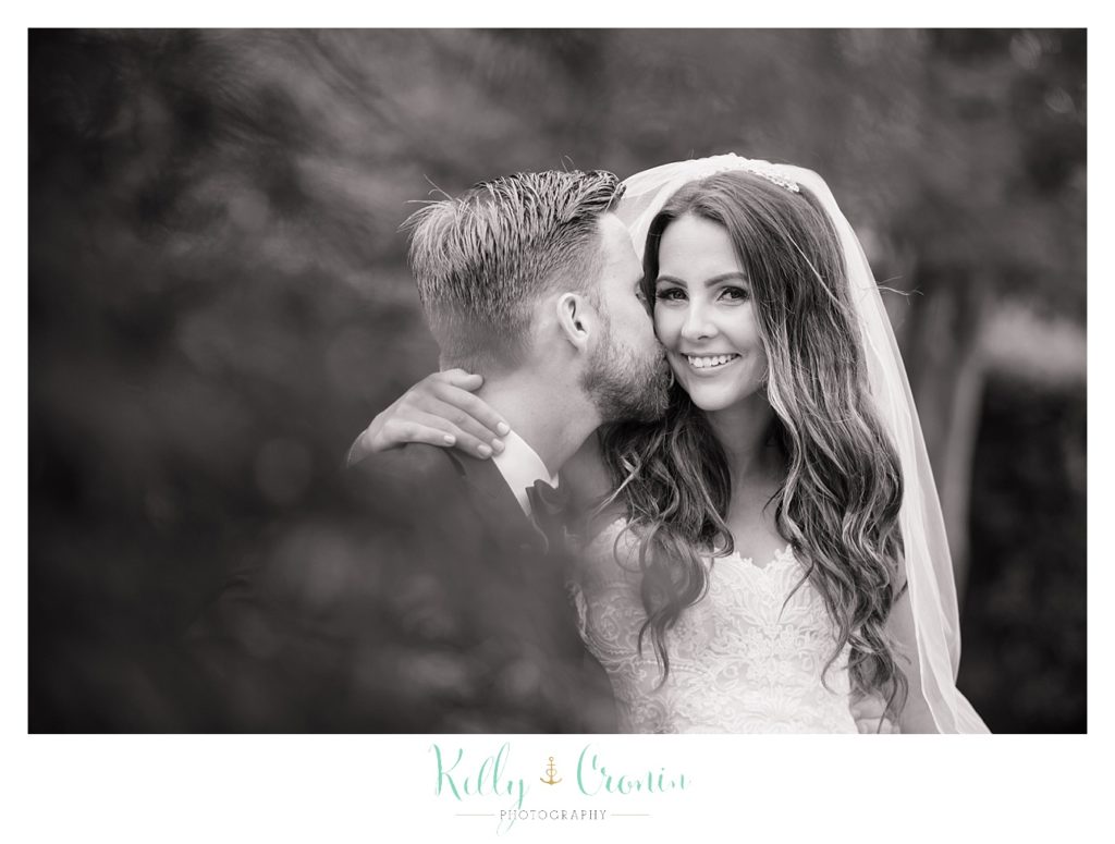 A newlywed couple sneak a private moment alone | Kelly Cronin Photography | Cape Cod love story