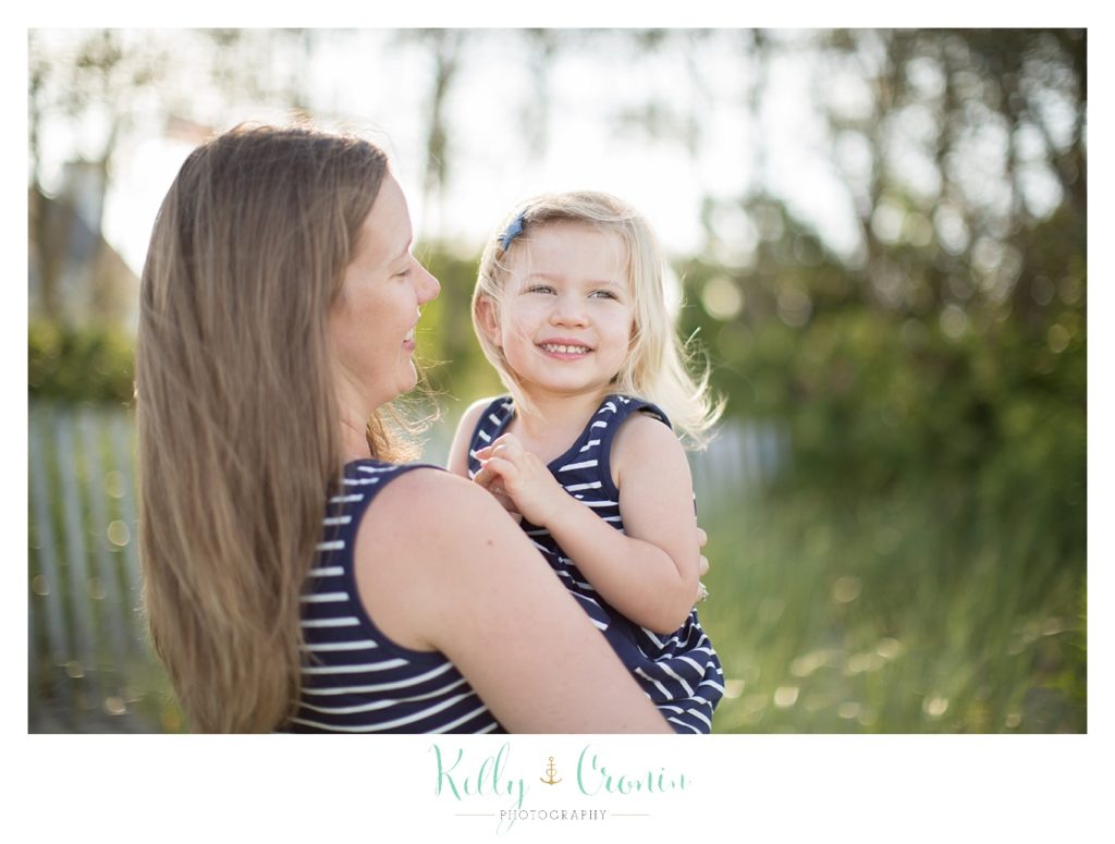 A mother holds her child | Kelly Cronin Photography | Family Photography in Cape Cod