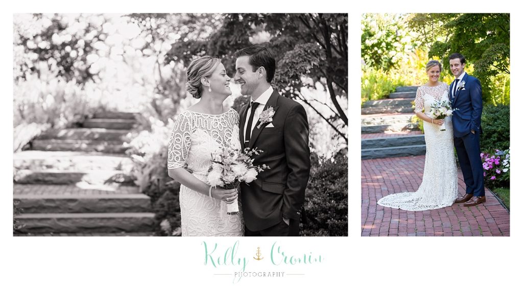 A couple pose for wedding photos. 