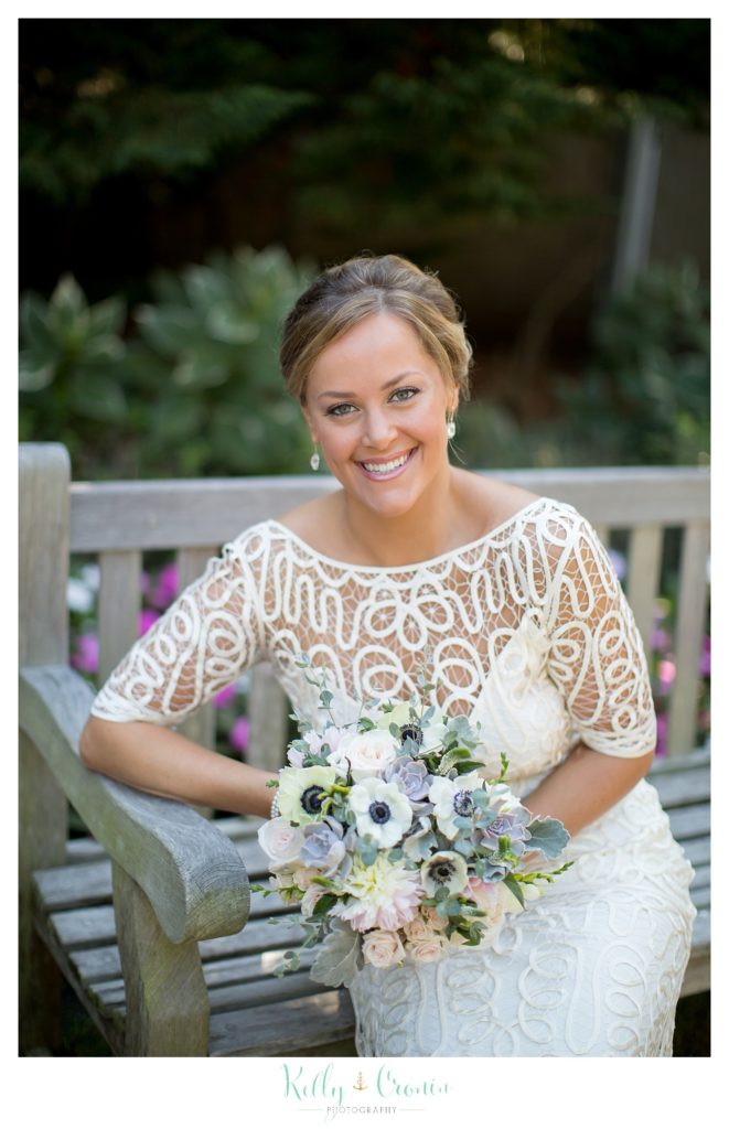 A woman smiles after her wedding at Wequassett Resort and Golf Club. 