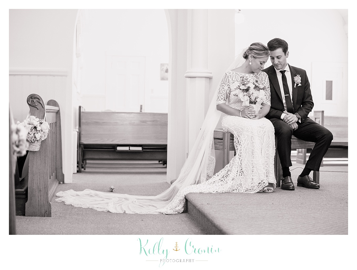 A couple pray before their wedding.
