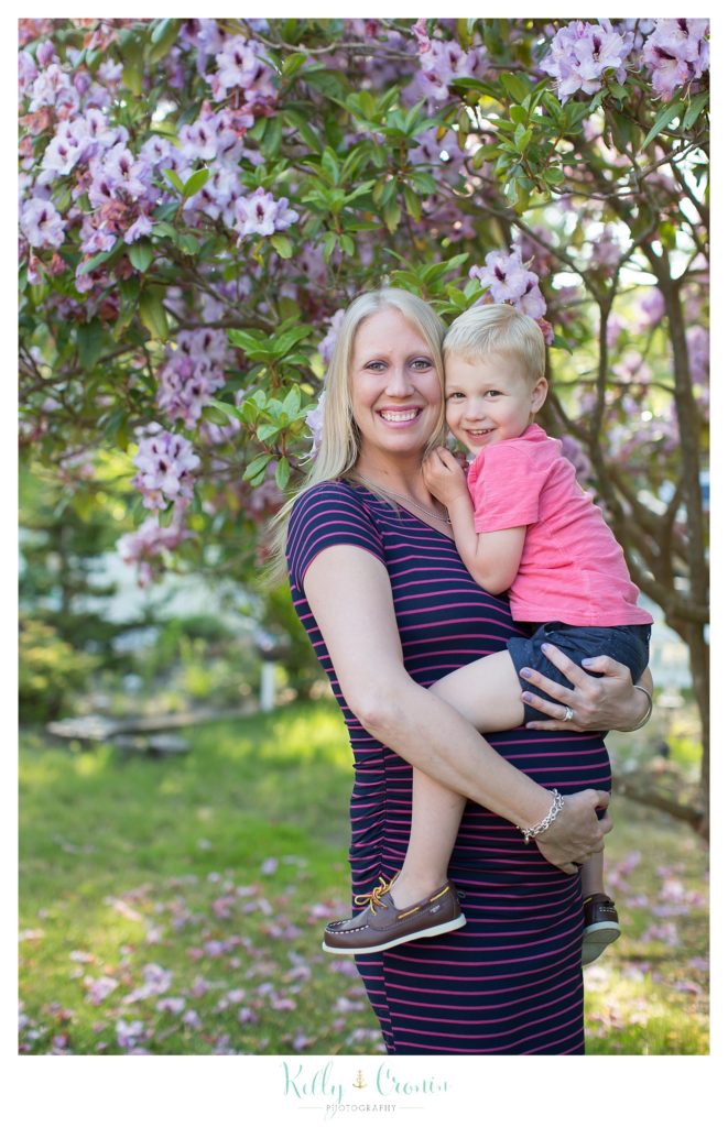 A mother holds her child during some family mini sessions. 