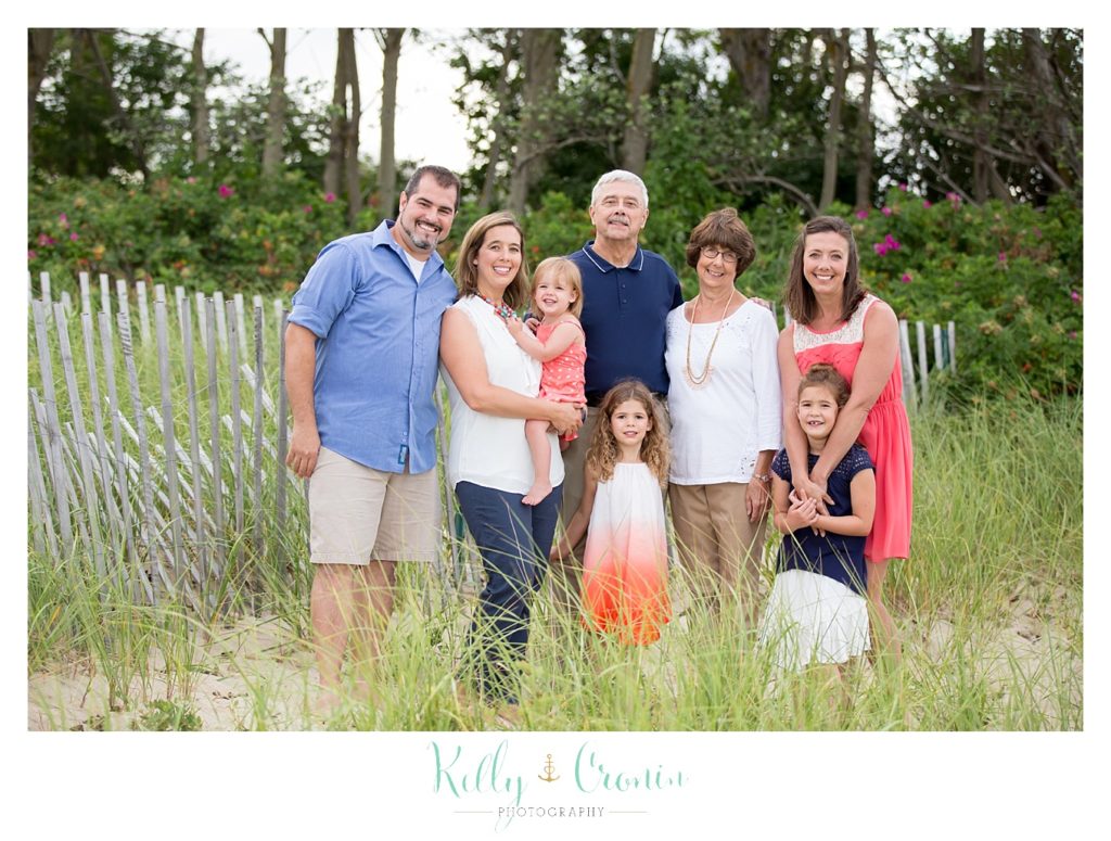 A family stands together for their Family Photography Session