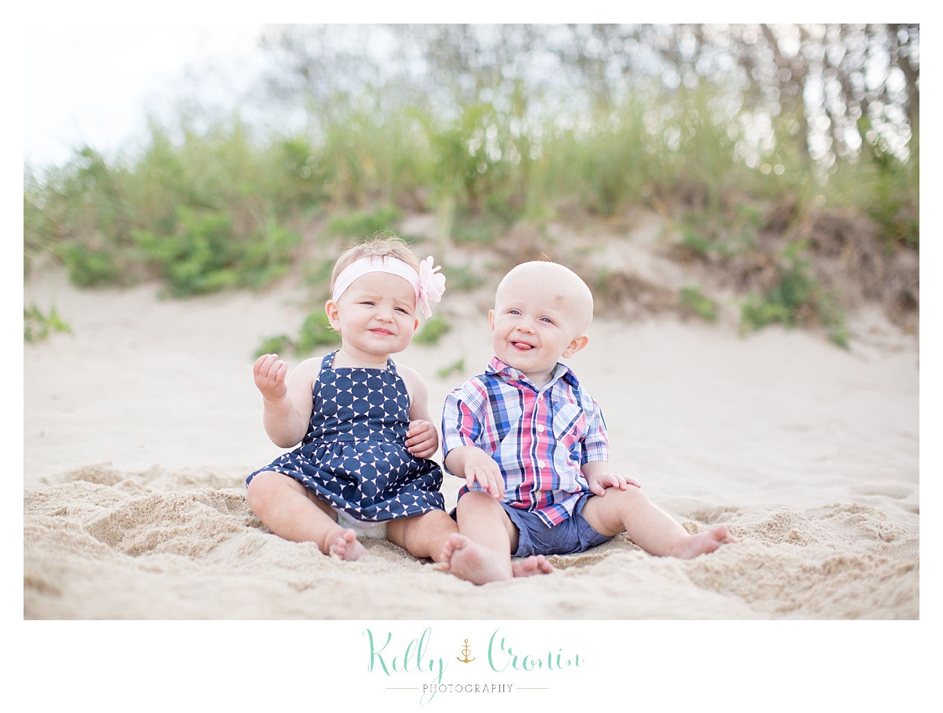 Twin babies sit in the sand | Family Photographer In Cape Cod