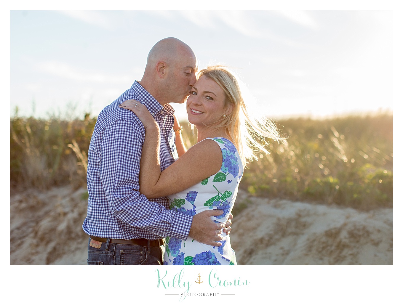 A man kisses his fiance | Engagement Session In Cape Cod