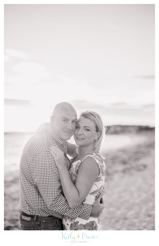 A couple stand close to each other | Engagement Session In Cape Cod