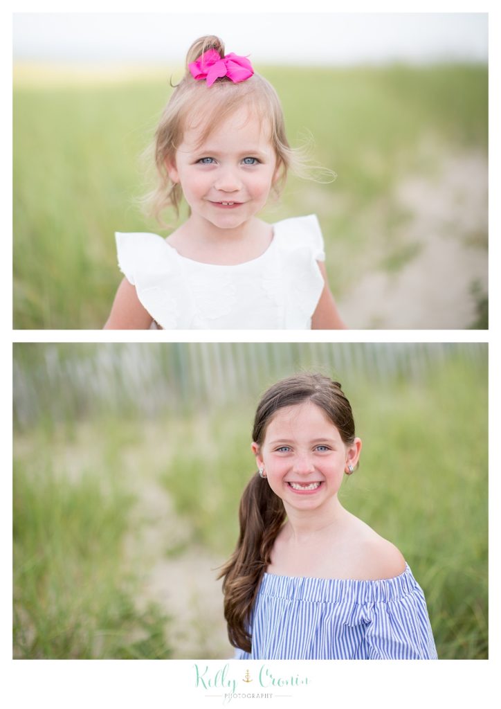 Two girl smiles for their Outdoor Family Photos. 