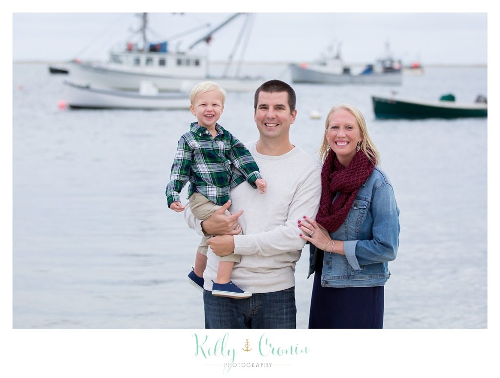 Two parents stand with their son | Mini Family Photo Sessions