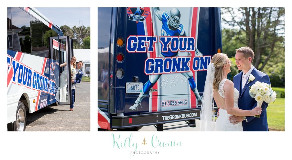 A man kisses his bride in front of the Gronk Party Bus. 